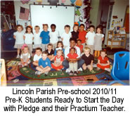 Pre-K students ready to start the day with pledge and their practium teacher.